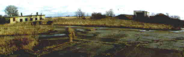 Nike Missile Site C-47 Wheeler Indiana Generator building and warheading building behind protective earth berms