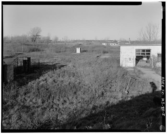 VIEW FROM BERM NORTHEAST, Launch Area: generator building, paint shed, E.M. barracks, missile assembly building